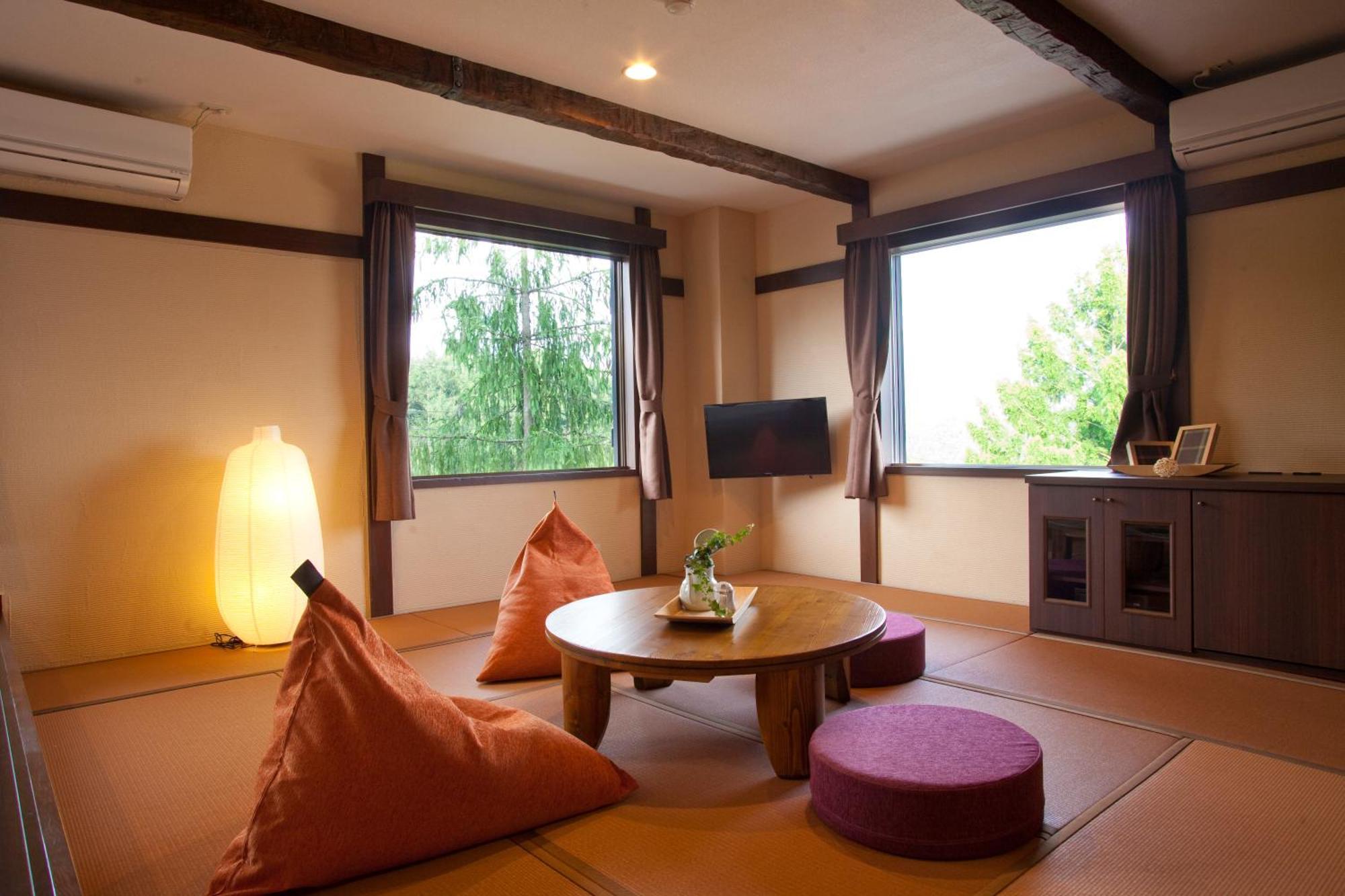 Hotel Hakuba Berghaus Отари Номер фото