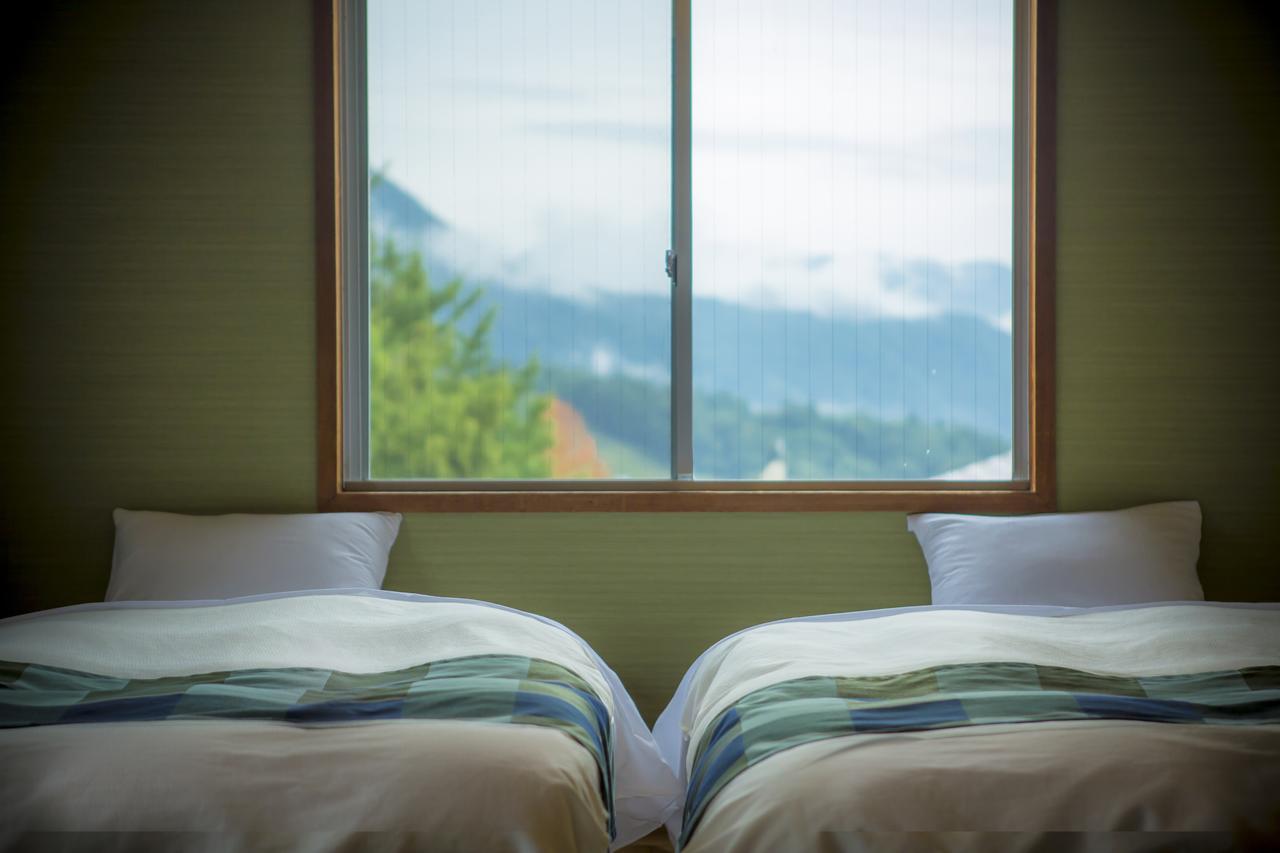 Hotel Hakuba Berghaus Отари Экстерьер фото